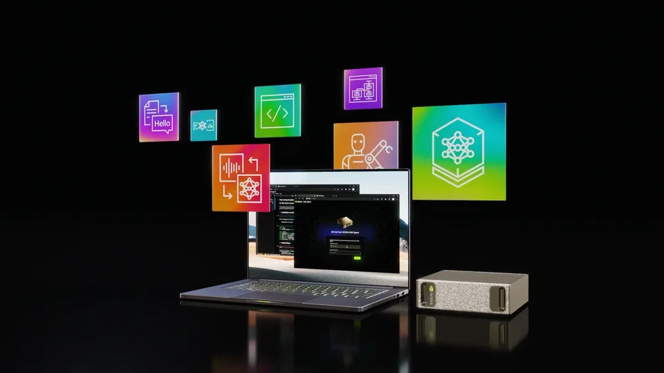 NVIDIA DGX Spark desktop system beside a laptop with colorful AI-themed graphics.