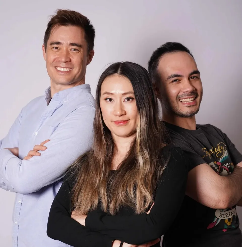 Portrait of three members of the Jev team standing together.