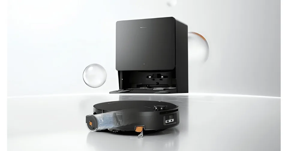 Roborock Saros 20 Flow robot vacuum positioned in front of its automated docking station.