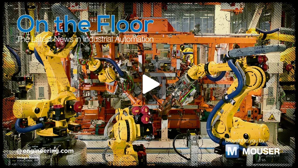 Industrial robotic arms operating on a factory production line.